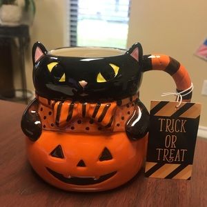 Halloween pumpkin cat mug pairs well with Rae Dunn